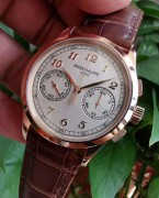 Patek Philippe 百达翡丽5170R-010 18K玫瑰金，手动机械计时男表，表径：39.5毫米，公价：610700元，