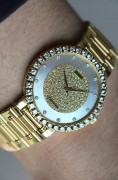 伯爵G0A09856  18k黄金 表径34mm 自动机械表  整表93克  表盘表盘原镶钻石  腕周190mm以内任意调节  类似款原价60万左右 这款钻石更大  全原装现货好价出